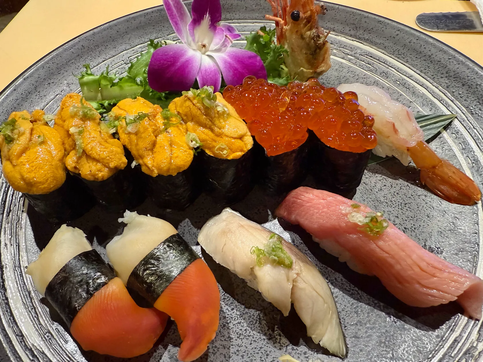Sushi and appetizer table spread